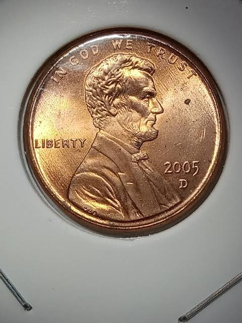 2005-D Lincoln penny flip-over double strike error showing two overlapping coin impressions